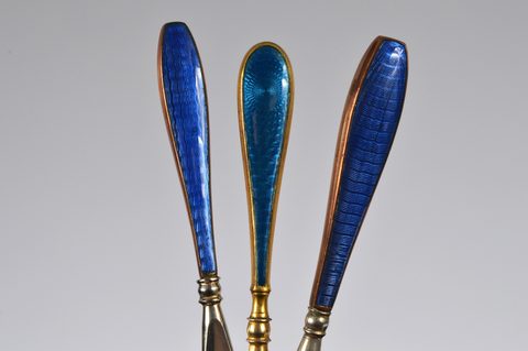 Six blue guilloche enamelled handled shoehorns
