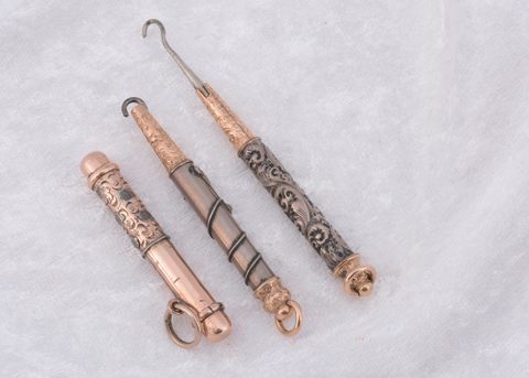 Three bi metal pull out button hooks
