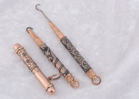 Three bi metal pull out button hooks