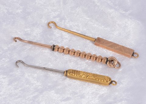 Three Edwardian button hooks