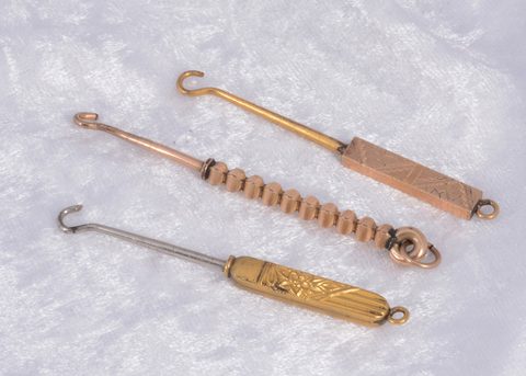 Three Edwardian button hooks