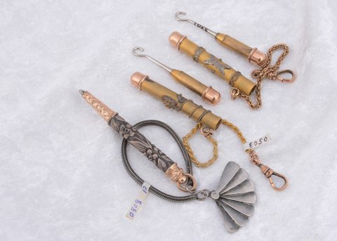 Three fob lapel button hooks