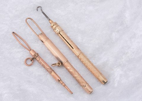 Three gold plated Edwardian button hooks