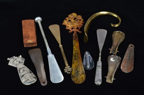 Twelve steel, brass and chromed shoehorns