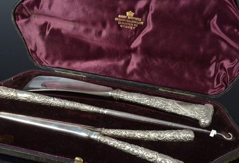 Two cased three piece silver sets