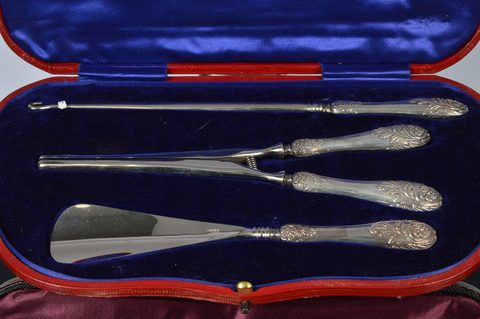 Two cased three piece silver sets