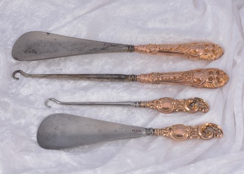 Two matched pairs of hooks and shoehorns
