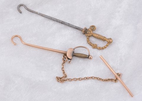 Two sword handled button hooks